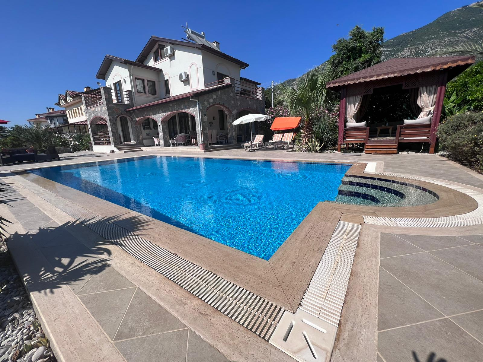 Stunning Spacious Villa in Ovacik Slide Image 5